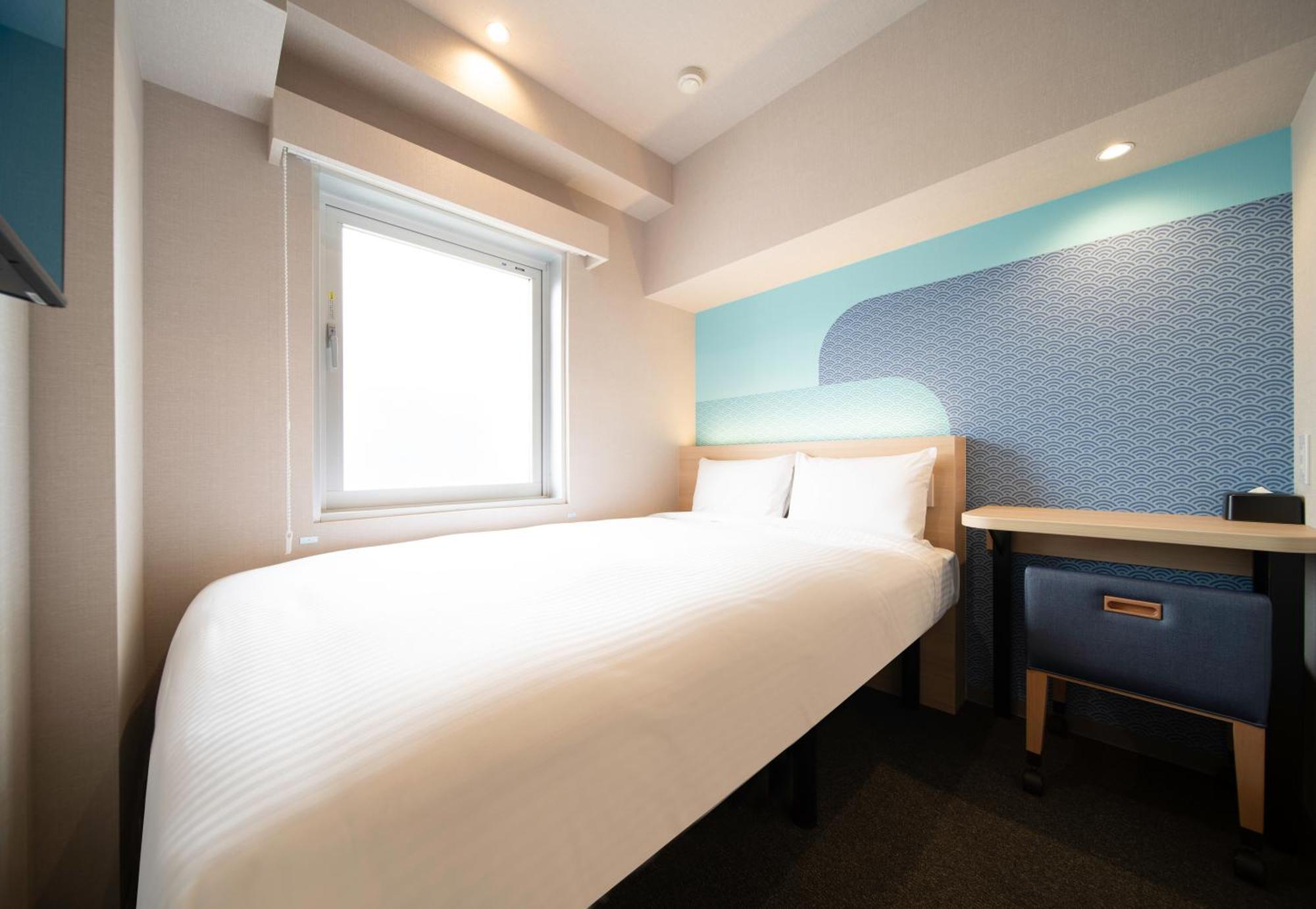 Hop Inn Tokyo Ueno Quarto foto